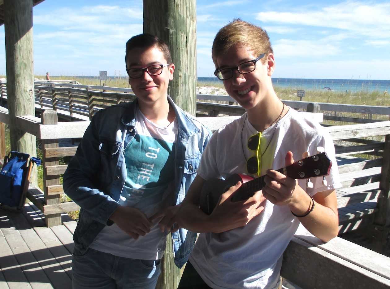 Crestview exchange students posing for picture with ukelele